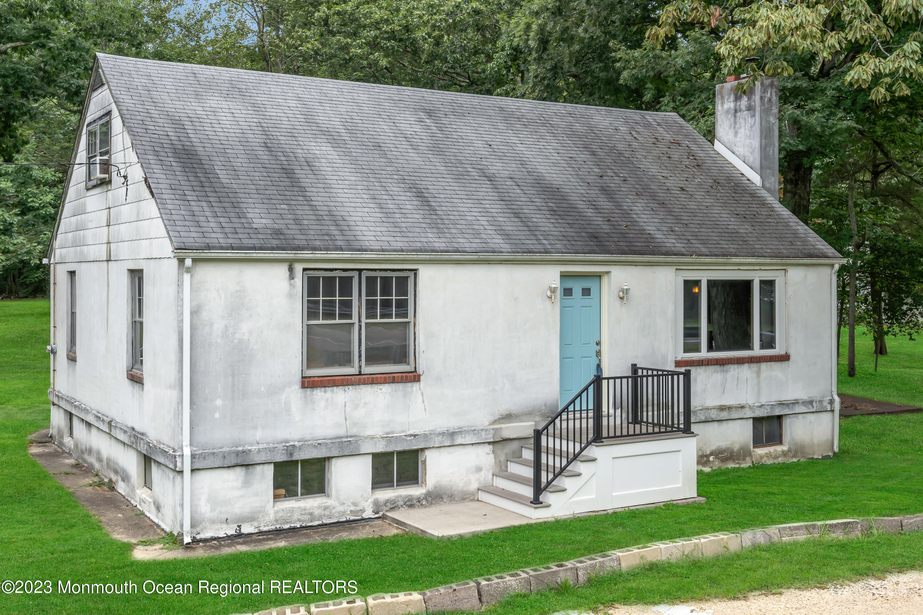 674 Harmony Road Jackson, NJ 08527 - Photo 41 of 43 a view of house with a yard and sitting area