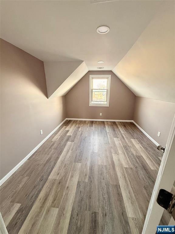 86 Hunter Street Lodi, NJ 07644 - Photo 14 of 15 a view of an empty room and window