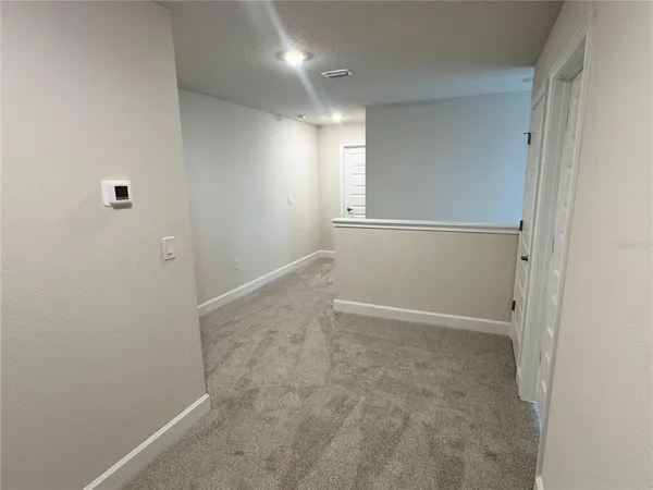 an empty room with an entryway