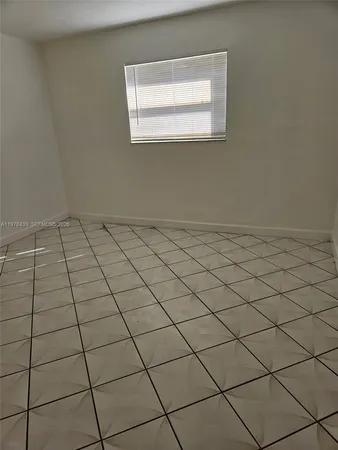 a view of a room and window