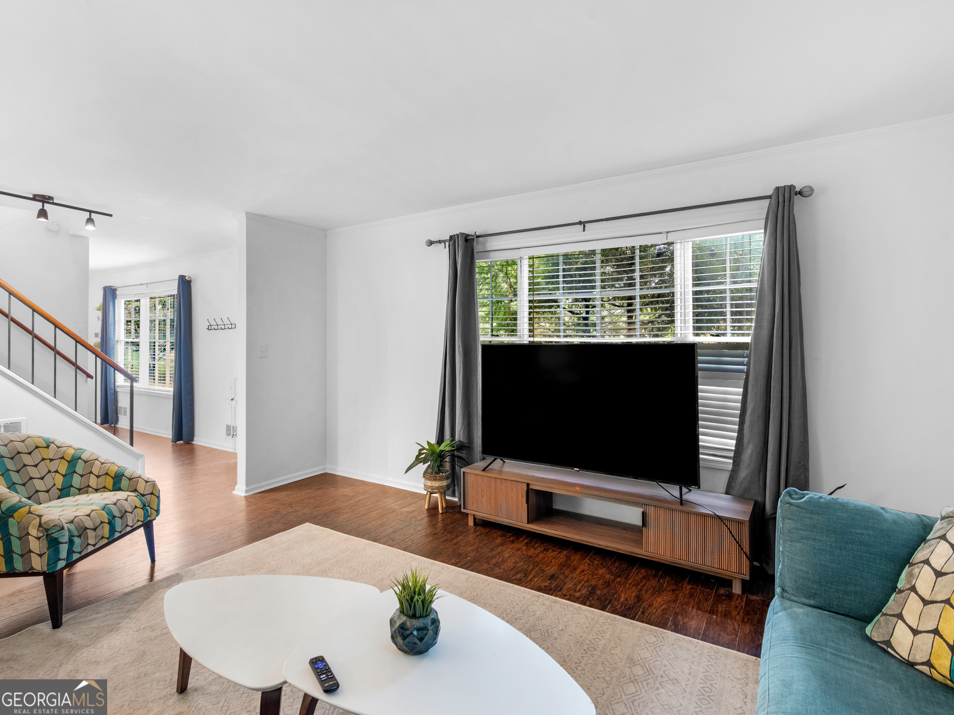 262 Rhodes Drive Athens, GA 30606 - Photo 4 of 21 a living room with furniture and a flat screen tv