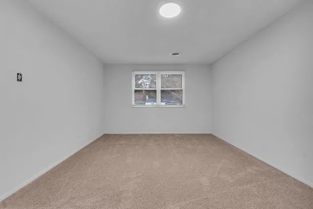 a bathroom with a sink a bathtub and a mirror