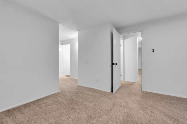 a bathroom with a sink toilet and a mirror