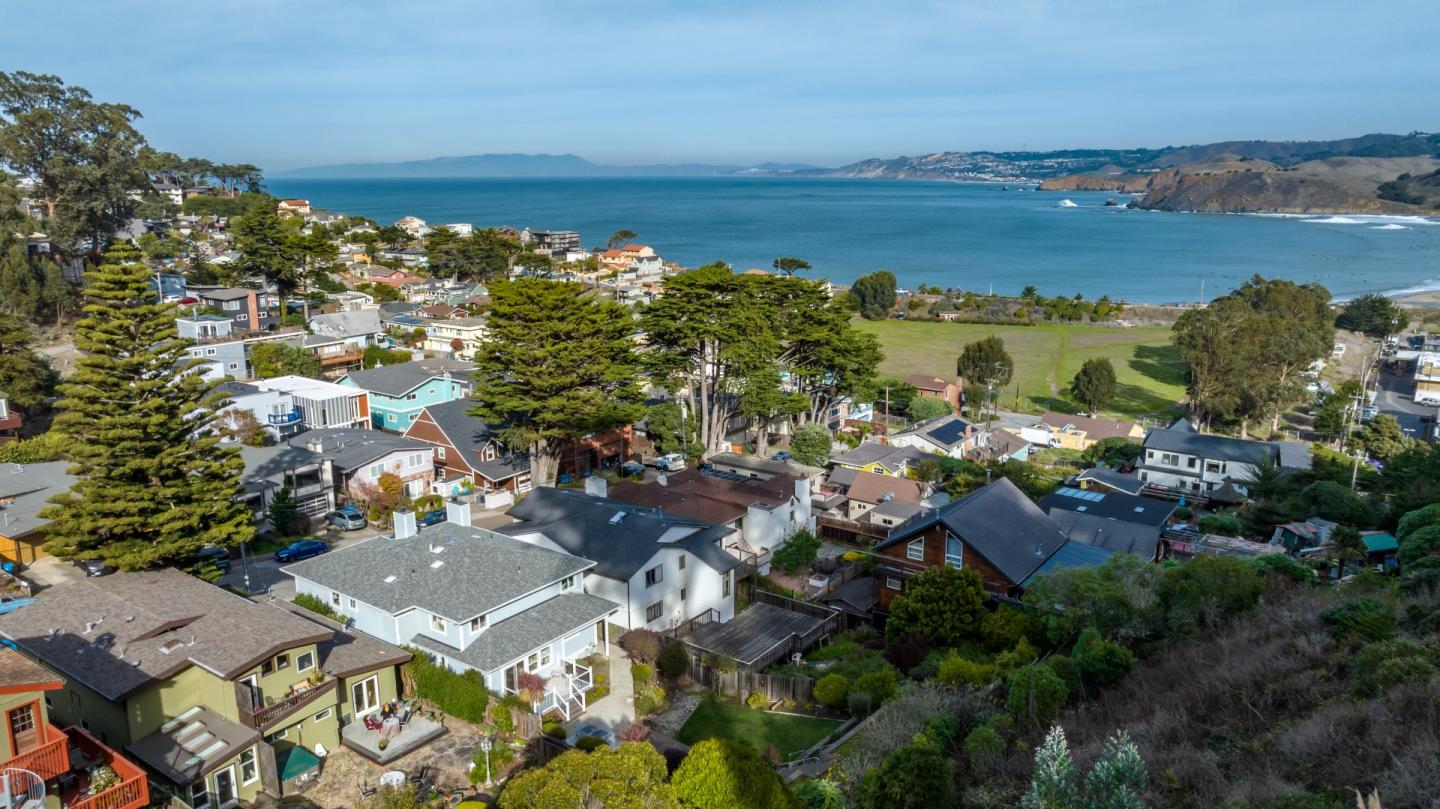 1415 Grand Avenue Pacifica, CA 94044 - Photo 1 of 47 an aerial view of ocean and residential houses with outdoor space