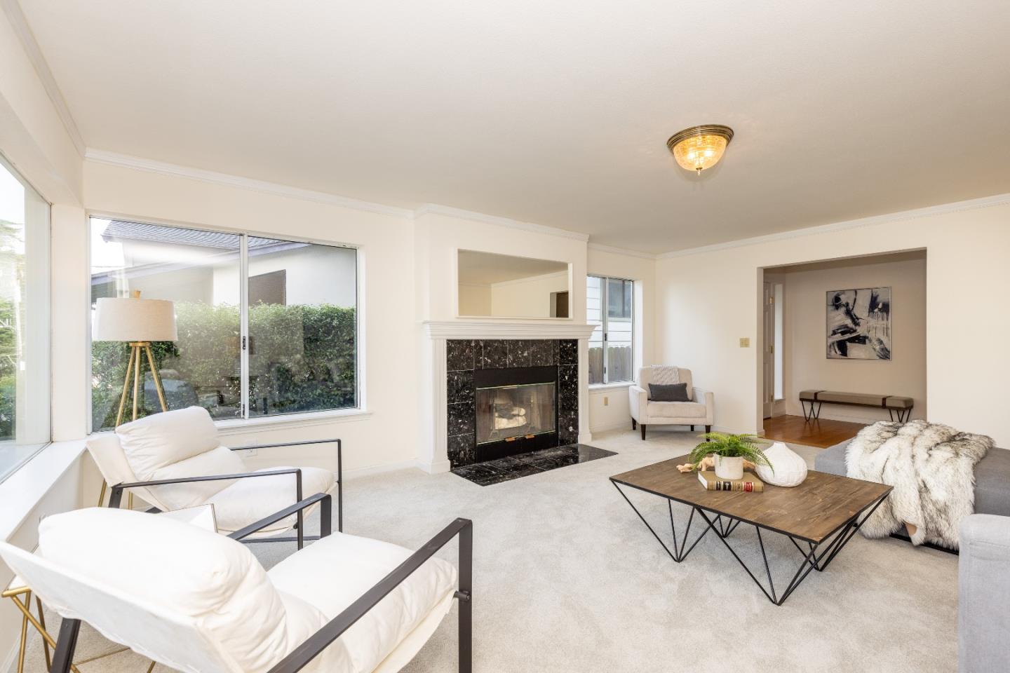 1415 Grand Avenue Pacifica, CA 94044 - Photo 11 of 47 a living room with furniture and a fireplace