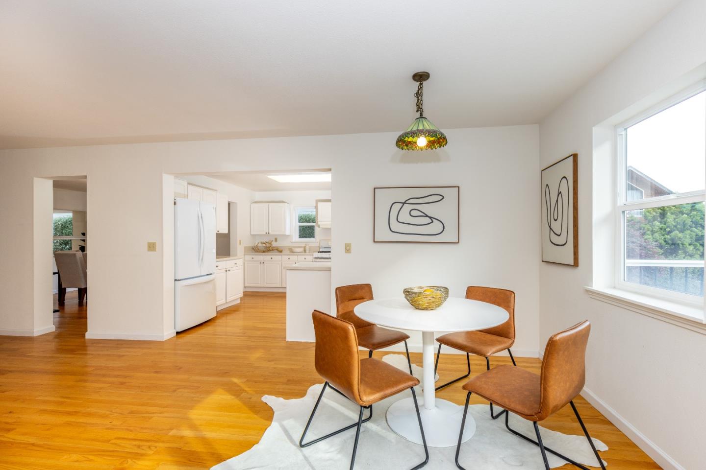 1415 Grand Avenue Pacifica, CA 94044 - Photo 19 of 47 a dining room with a table and chairs