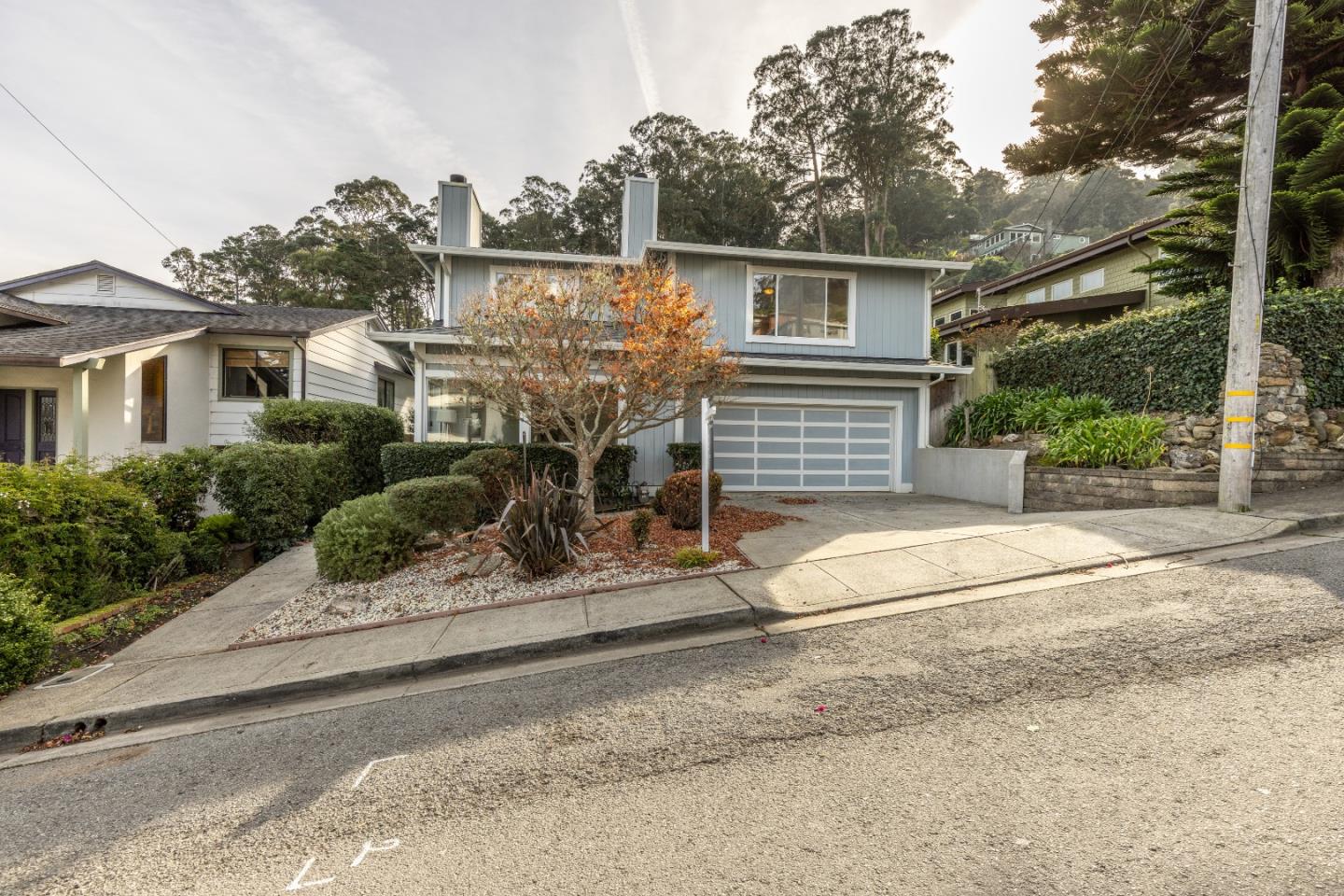 1415 Grand Avenue Pacifica, CA 94044 - Photo 2 of 47 front view of house with potted plants