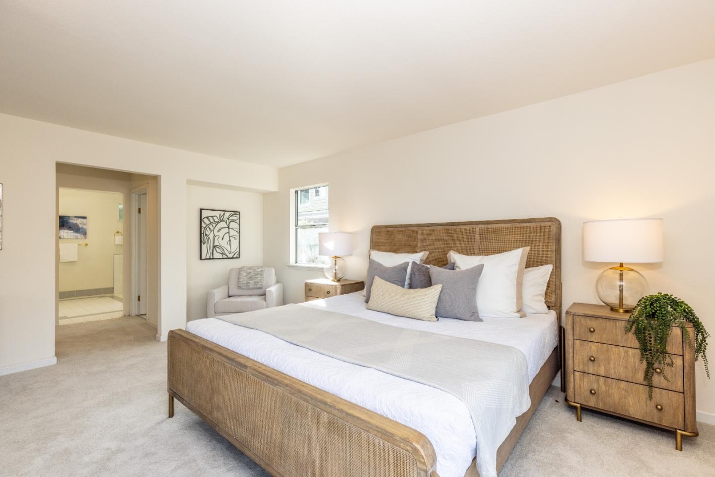 1415 Grand Avenue Pacifica, CA 94044 - Photo 21 of 47 a bedroom with a bed and a lamp