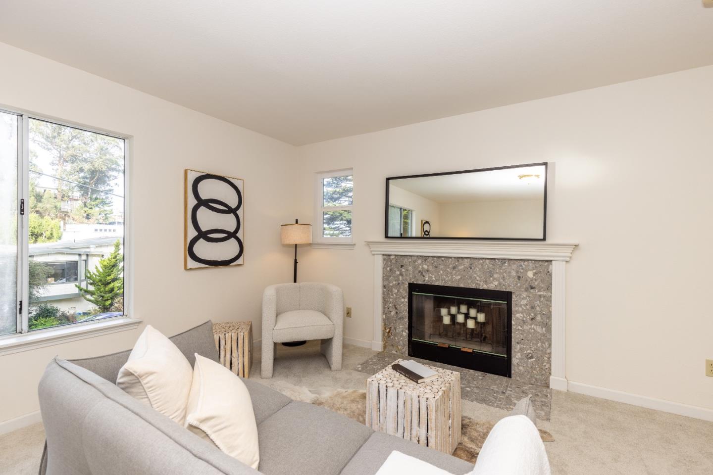1415 Grand Avenue Pacifica, CA 94044 - Photo 22 of 47 a living room with furniture and a fireplace