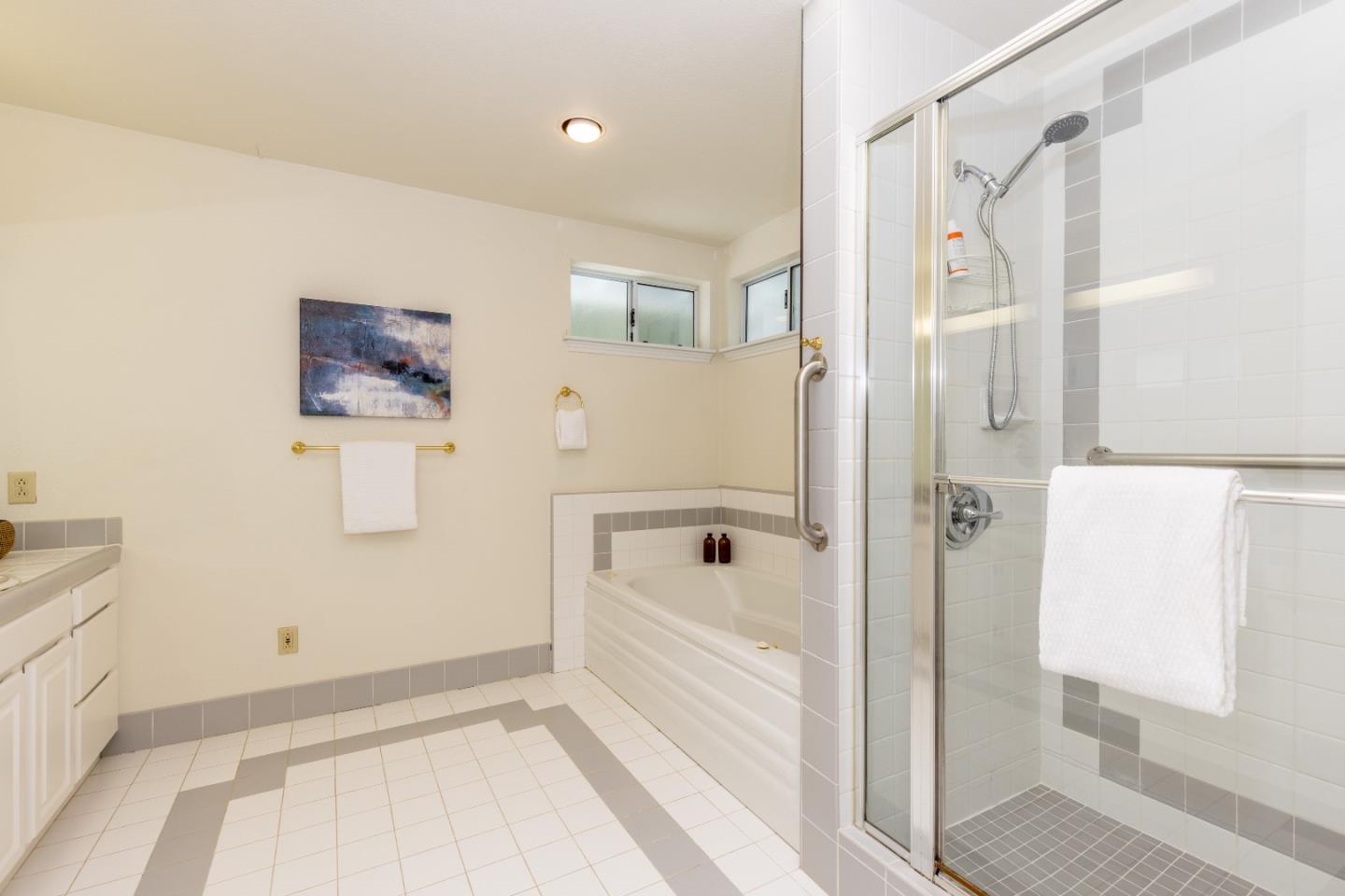 1415 Grand Avenue Pacifica, CA 94044 - Photo 32 of 47 a bathroom with a bathtub and a shower