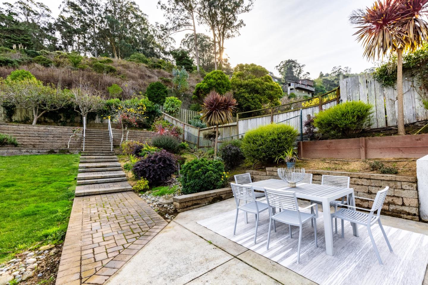1415 Grand Avenue Pacifica, CA 94044 - Photo 36 of 47 a view of a backyard with sitting area