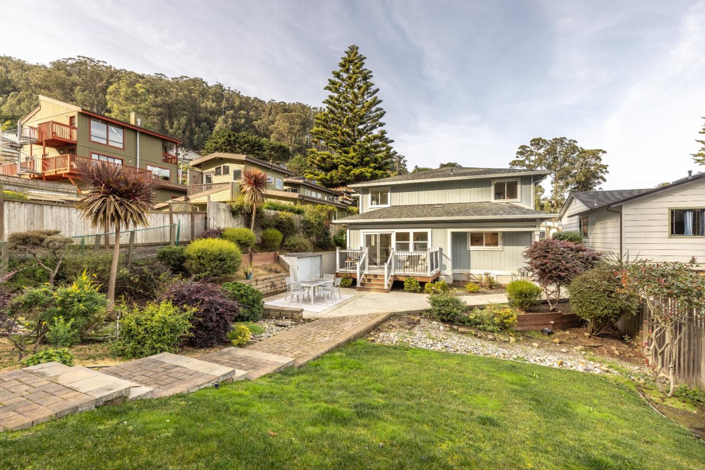 1415 Grand Avenue Pacifica, CA 94044 - Photo 38 of 47 a front view of house with yard and trees around
