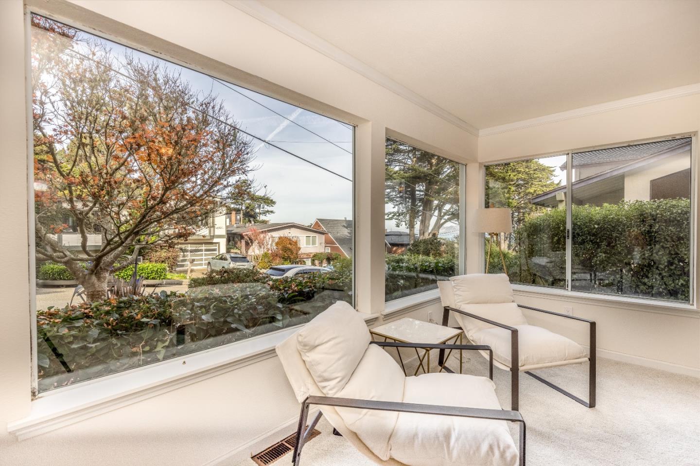 1415 Grand Avenue Pacifica, CA 94044 - Photo 10 of 47 a living room with a large window and furniture