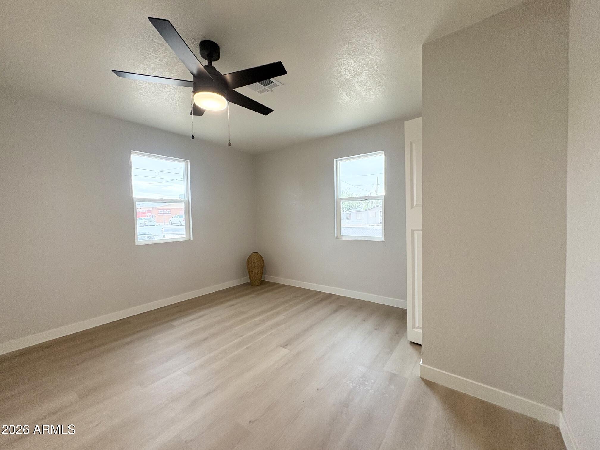 175 South Matilda Street Florence, AZ 85132 - Photo 11 of 16 a view of an empty room with a window