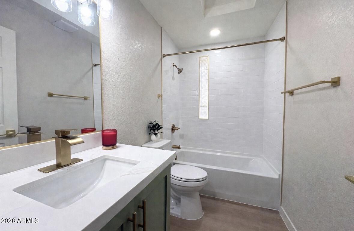 175 South Matilda Street Florence, AZ 85132 - Photo 13 of 16 a bathroom with a sink toilet vanity and shower