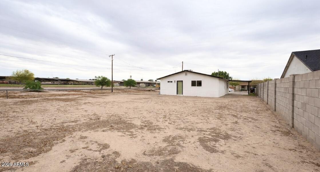 175 South Matilda Street Florence, AZ 85132 - Photo 16 of 16 a view of a house with a yard