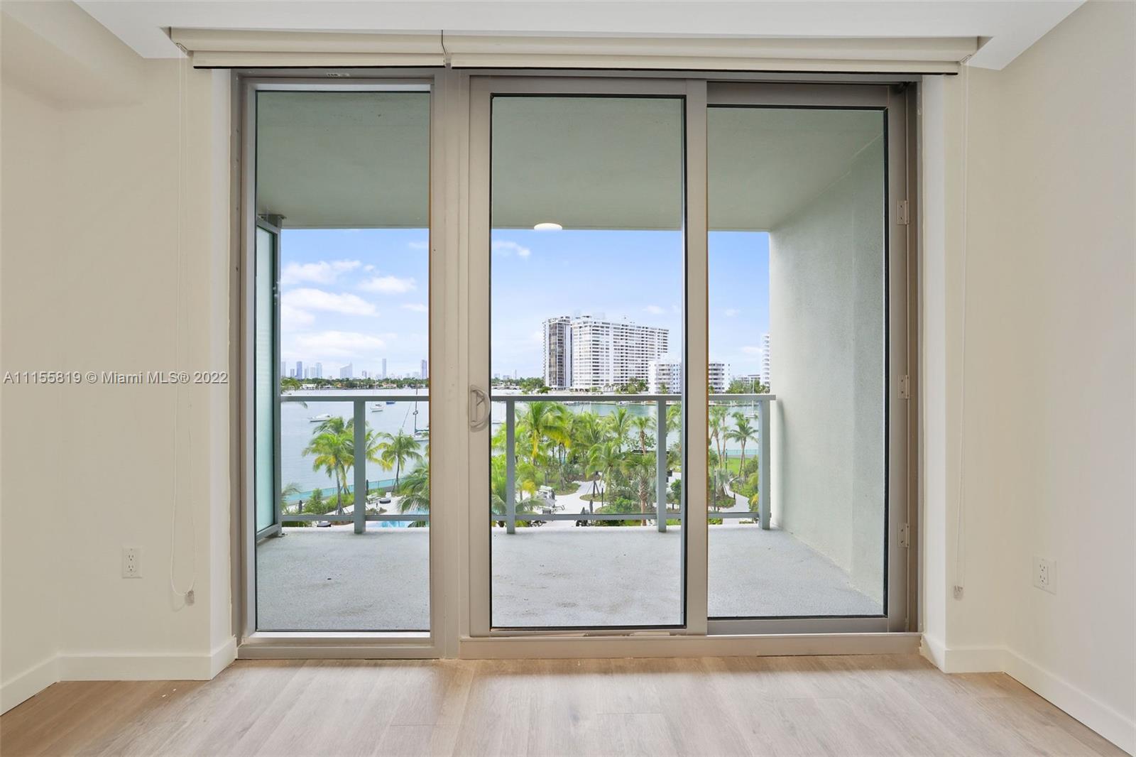 1504 Bay Road, Unit N1508 Miami Beach, FL 33139 - Photo 19 of 89 a view of a glass door and a window