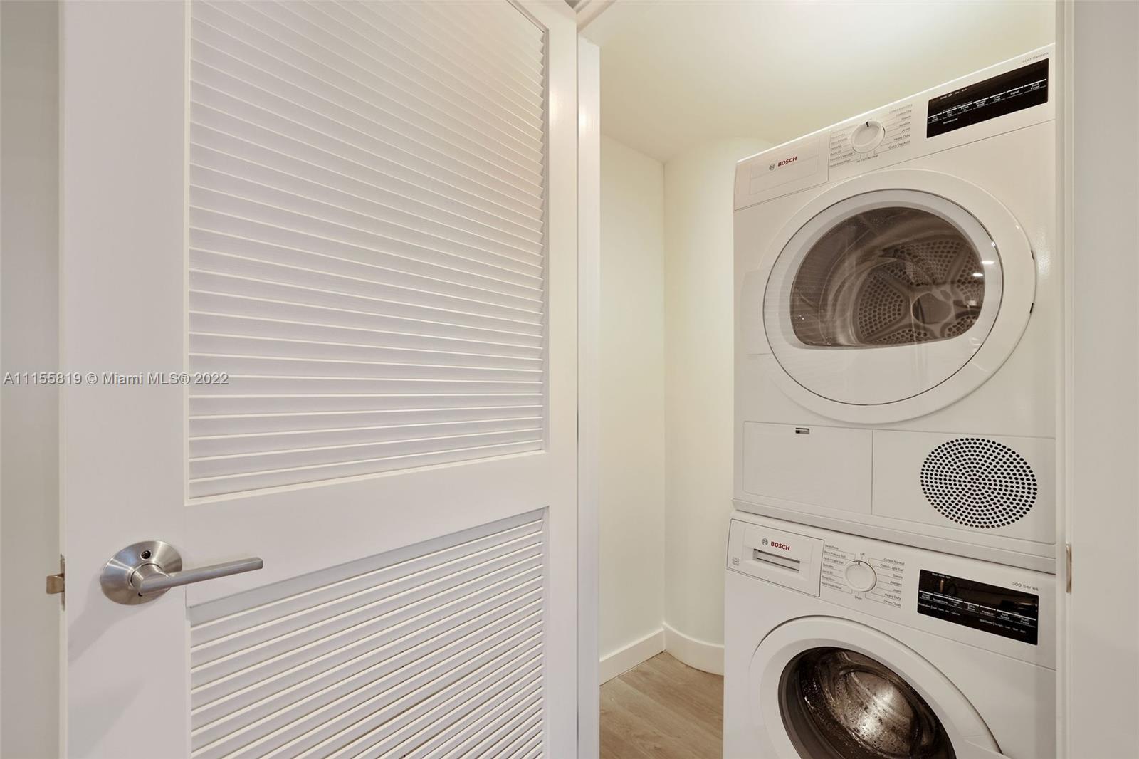 1504 Bay Road, Unit N1508 Miami Beach, FL 33139 - Photo 26 of 89 a utility room with dryer and washer