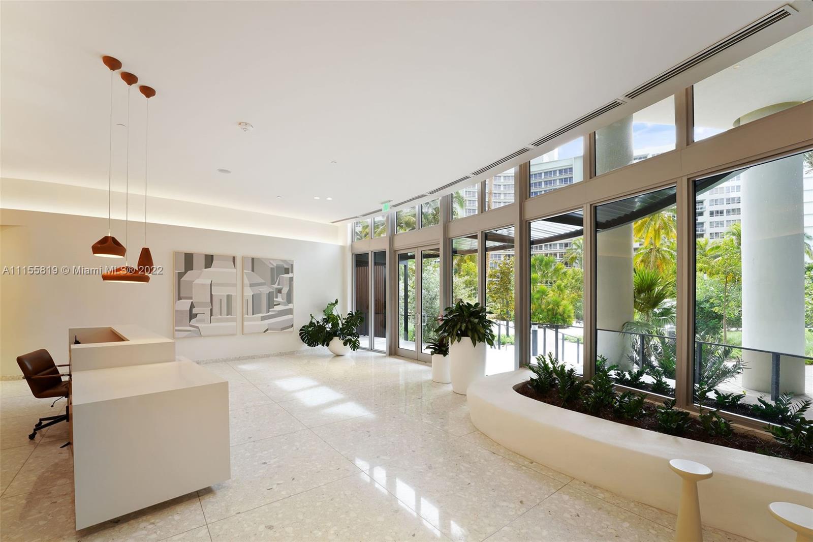 1504 Bay Road, Unit N1508 Miami Beach, FL 33139 - Photo 76 of 89 a living room with furniture and large windows
