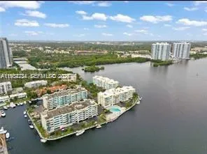 a view of a city with an ocean