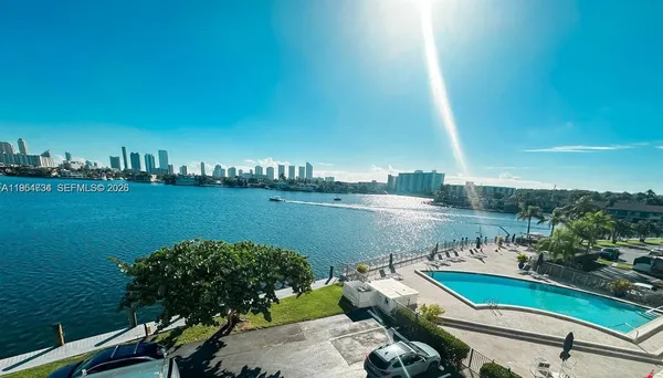 a view of a lake with a city view