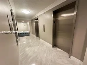 a view of a hallway with a elevator