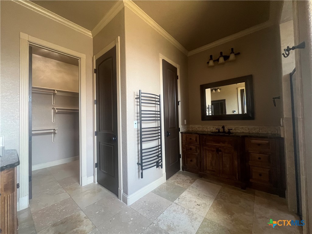 523 Messer Ranch Road Belton, TX 76513 - Photo 22 of 40 a bathroom with a sink and a mirror