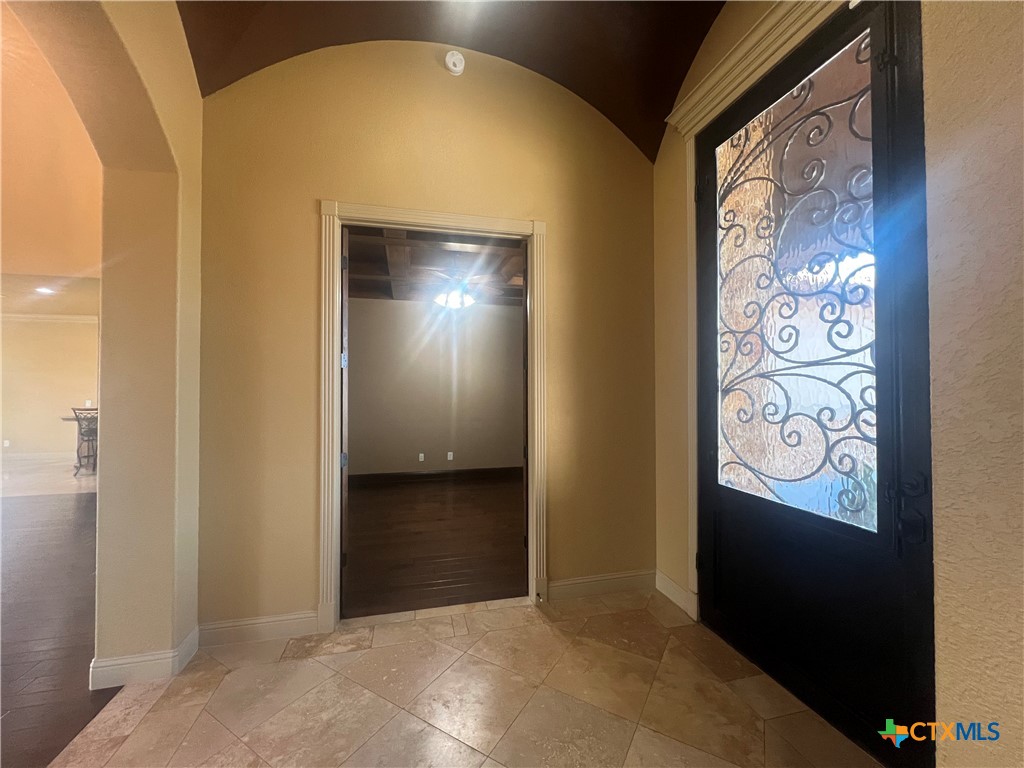 523 Messer Ranch Road Belton, TX 76513 - Photo 26 of 40 a view of a hallway with wooden floor