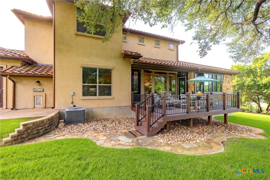 523 Messer Ranch Road Belton, TX 76513 - Photo 4 of 40 a front view of a house with a yard table and chairs