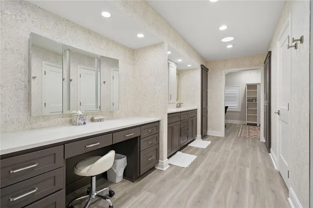 a utility room with sink dryer and washer