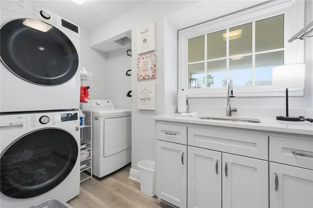 an aerial view of a city with lake view