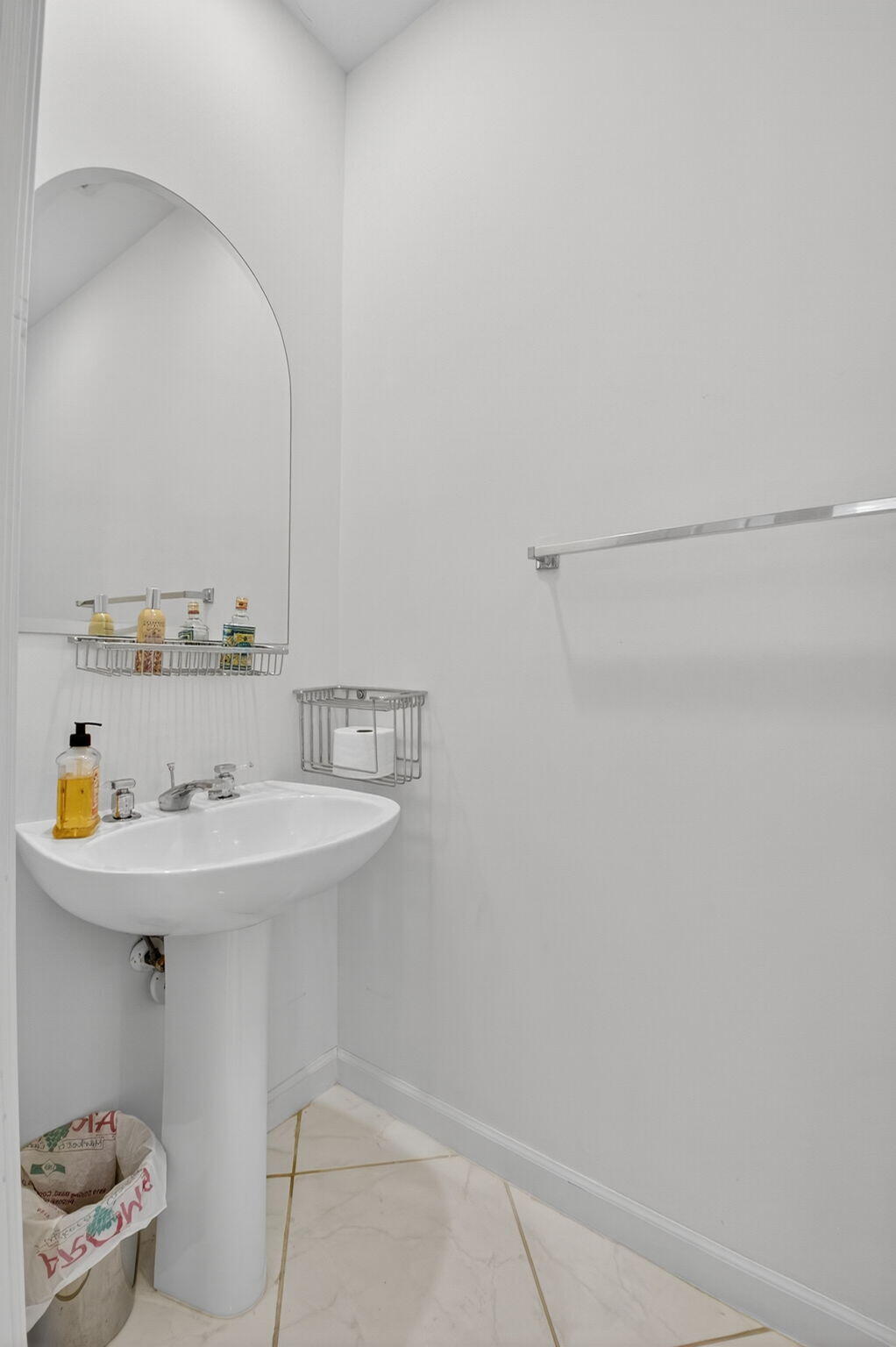 5309 Northwest 26th Circle Boca Raton, FL 33496 - Photo 16 of 37 a bathroom with a sink and a toilet