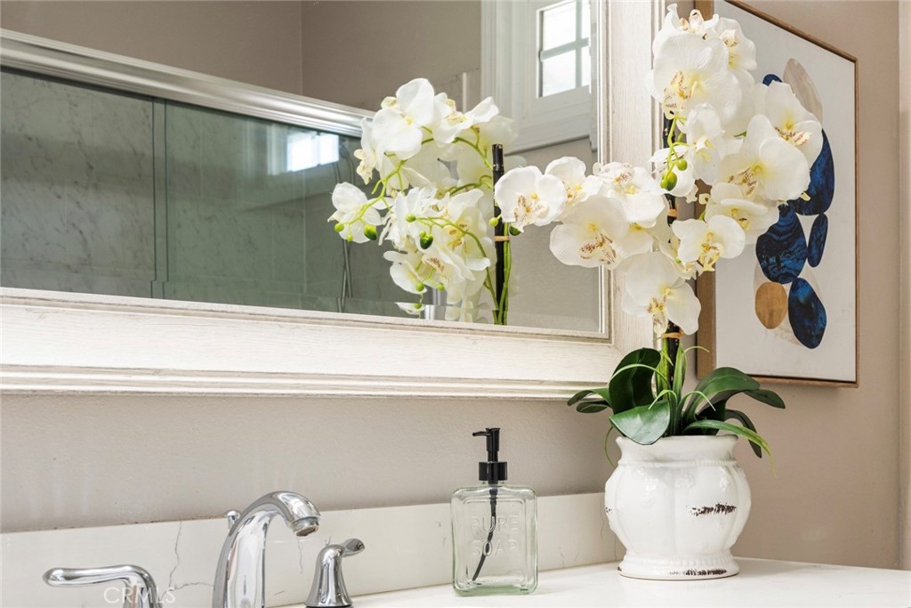 9 Newmeadow Irvine, CA 92614 - Photo 23 of 36 a vase of flowers sitting on a table