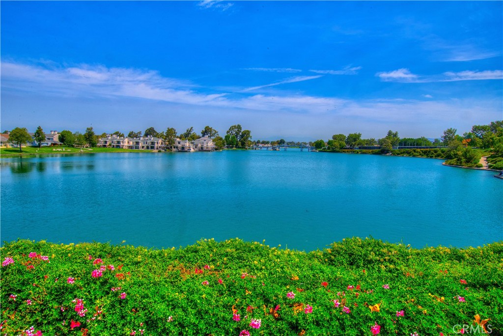 9 Newmeadow Irvine, CA 92614 - Photo 36 of 36 a view of a lake with a house in the background