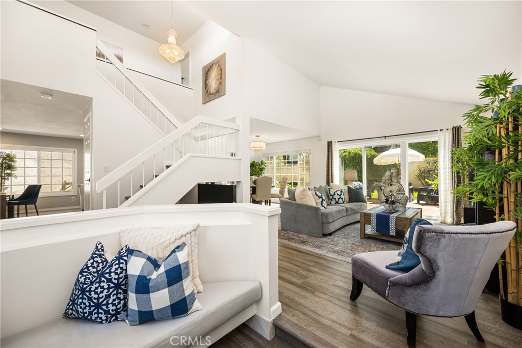 9 Newmeadow Irvine, CA 92614 - Photo 5 of 36 a living room with furniture and a large window