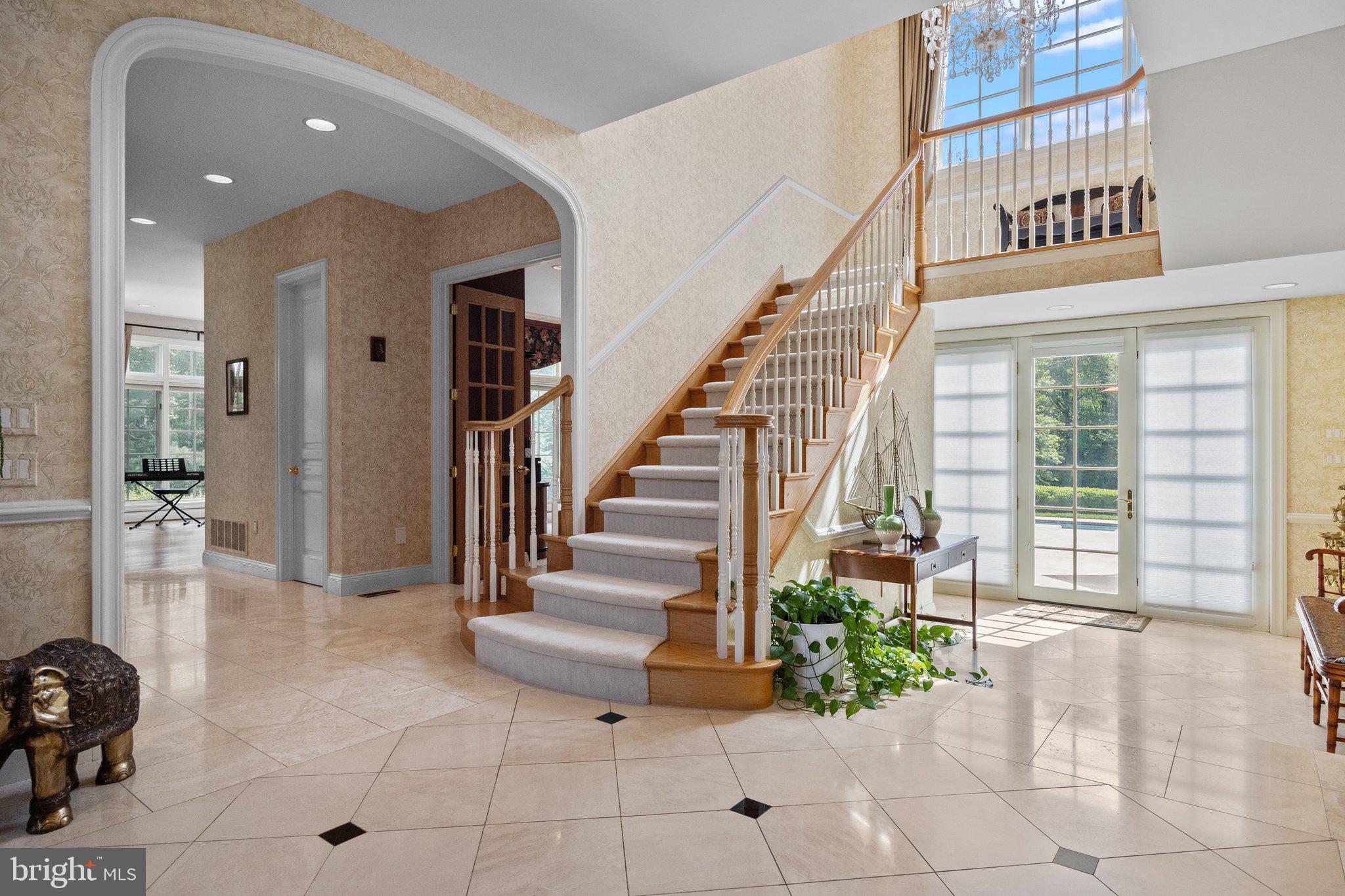 1049 McKean Road Ambler, PA 19002 - Photo 18 of 86 Turned Oak Staircase with Carpet Runner