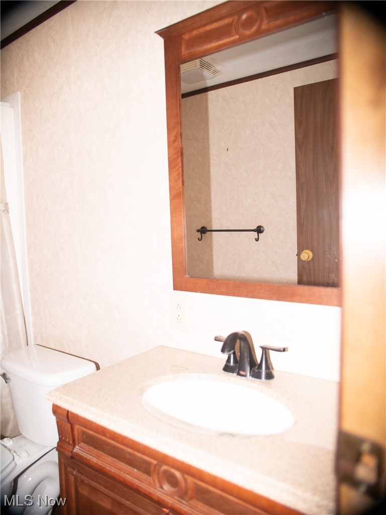 332 Max Road Lodi, OH 44254 - Photo 6 of 22 Bathroom featuring toilet and vanity