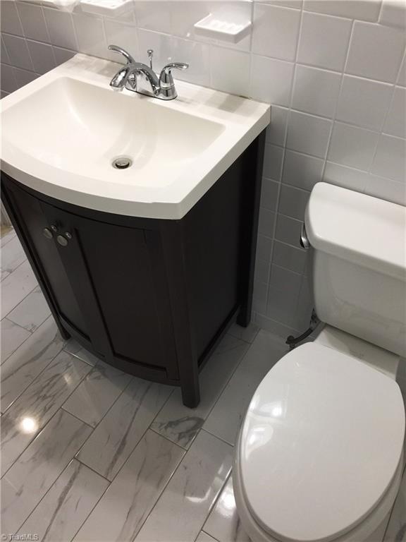 5617 Tower Road Greensboro, NC 27410 - Photo 11 of 17 Updated bathrooms