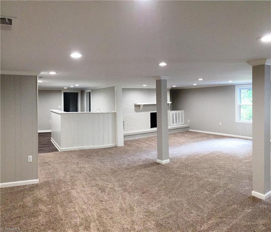 5617 Tower Road Greensboro, NC 27410 - Photo 14 of 17 Full finished basement w/bedroom, full bath and kitchenette/wet bar