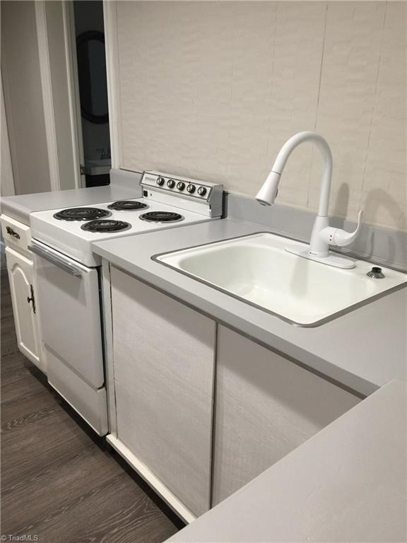 5617 Tower Road Greensboro, NC 27410 - Photo 15 of 17 Basement kitchenette/wet bar
