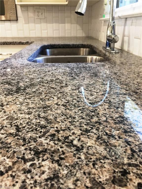 5617 Tower Road Greensboro, NC 27410 - Photo 4 of 17 Granite Counter Tops