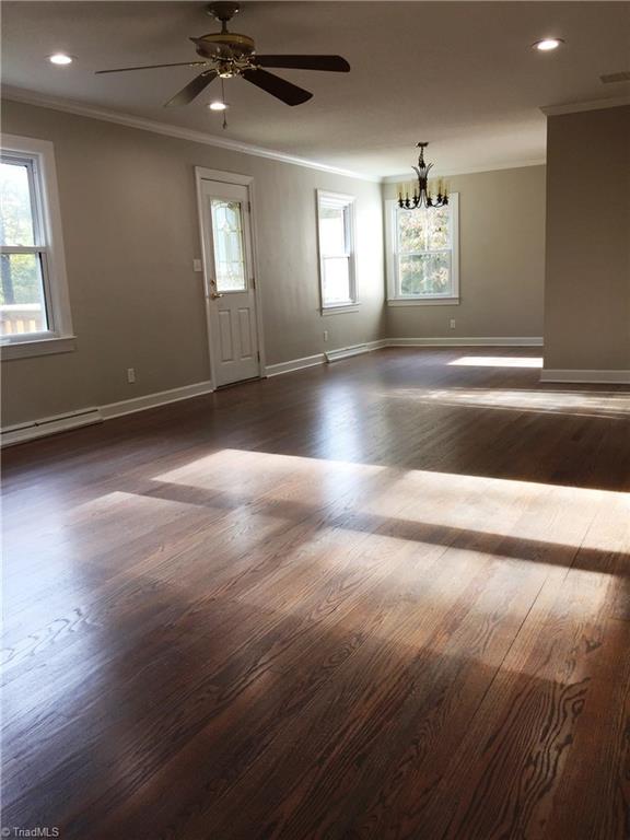 5617 Tower Road Greensboro, NC 27410 - Photo 9 of 17 Refinished hardwoods on main level