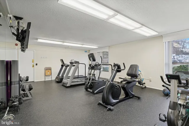 a view of a room with gym equipment