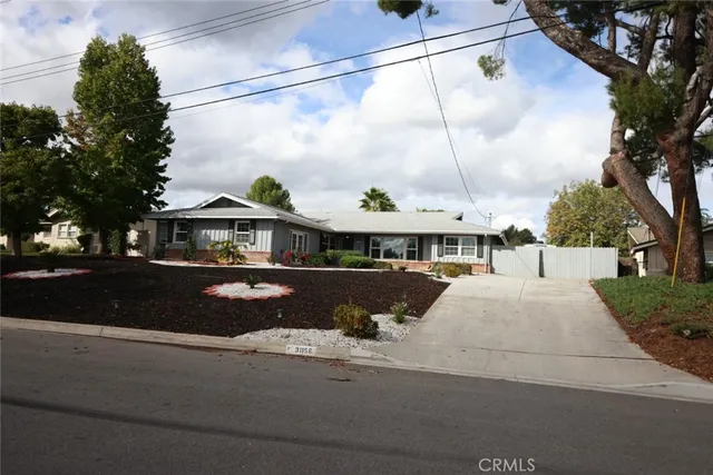 a view of building with cars park