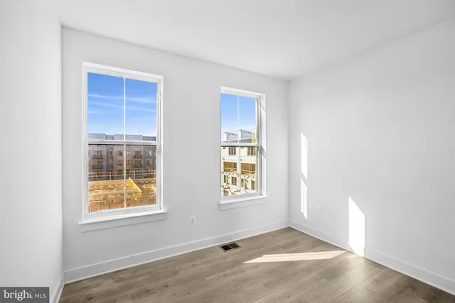 an empty room with windows