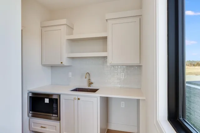 $699,900 | 1839 Woodward Circle, Raymore, MO 64083