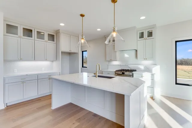 $699,900 | 1839 Woodward Circle, Raymore, MO 64083