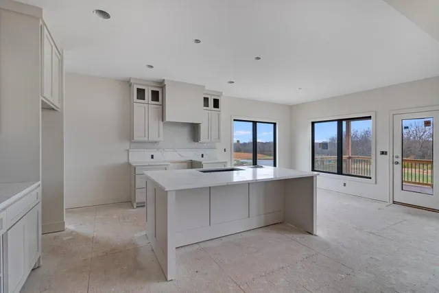 $699,900 | 1839 Woodward Circle, Raymore, MO 64083