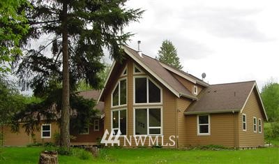 716 East Smith Road Bellingham, WA 98226 - Photo 1 of 1 a view of a house with a yard and plants