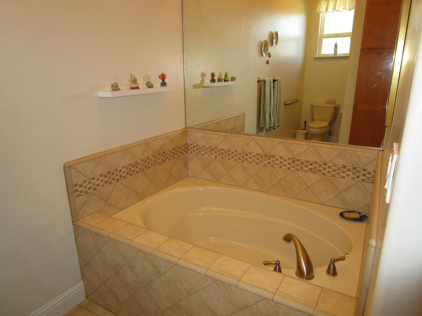 1320 Spring Grove Road Hollister, CA 95023 - Photo 17 of 51 a bathroom with a bathtub